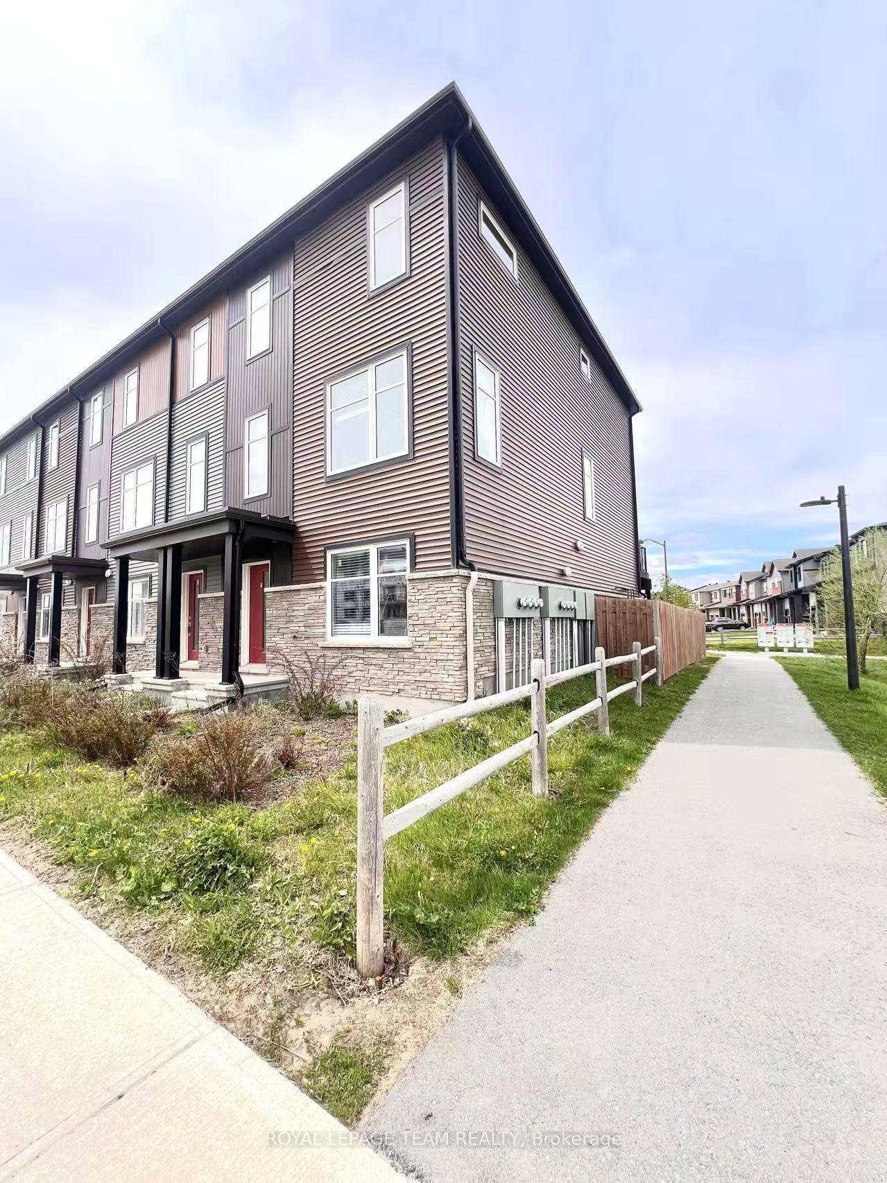 This double garage 3 story home offers 3 bedrooms plus a den, situated on a corner lot with no neighbours on one side.