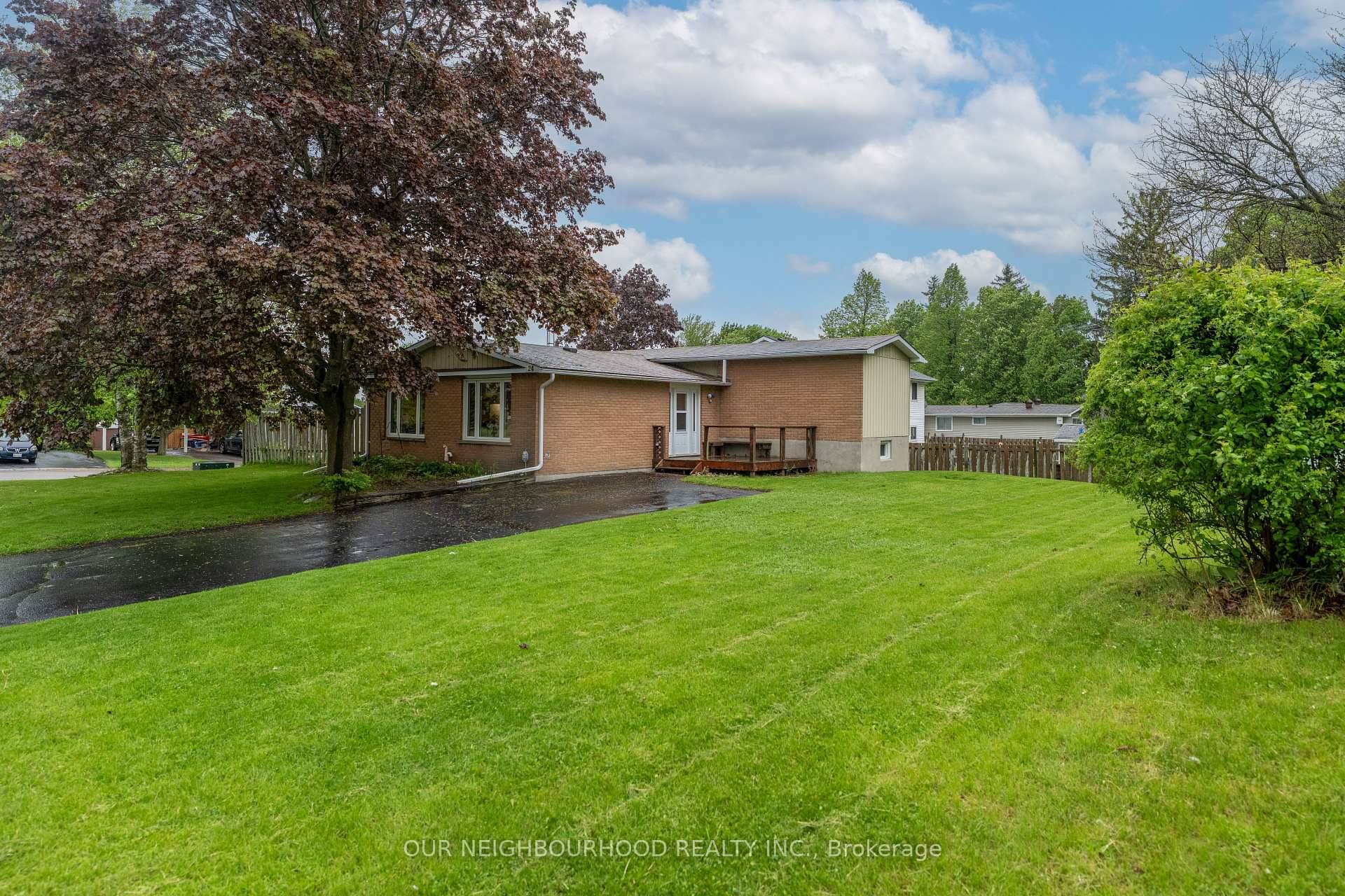 Spacious 4 level backsplit situated on a large corner lot in the heart of Orono !