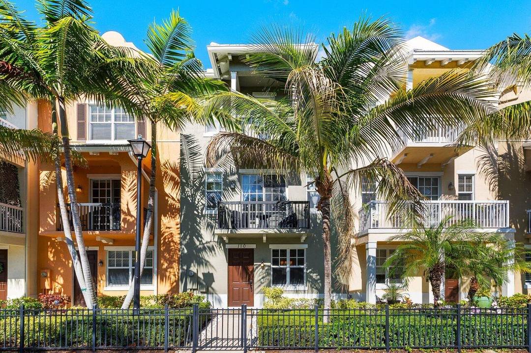 This spacious three story Key West Contemporary Townhome in CODA offers a well designed layout and thoughtful upgrades throughout.