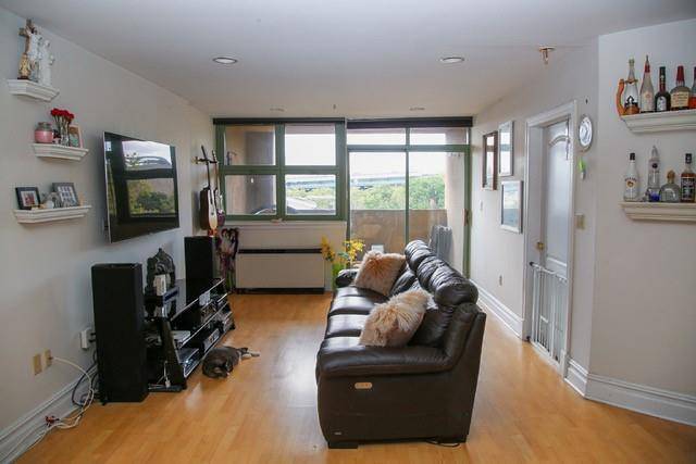Specious and Beautiful One Bedroom Apartment with Balcony overlooking the City in the heart of Astoria Park by the East River.