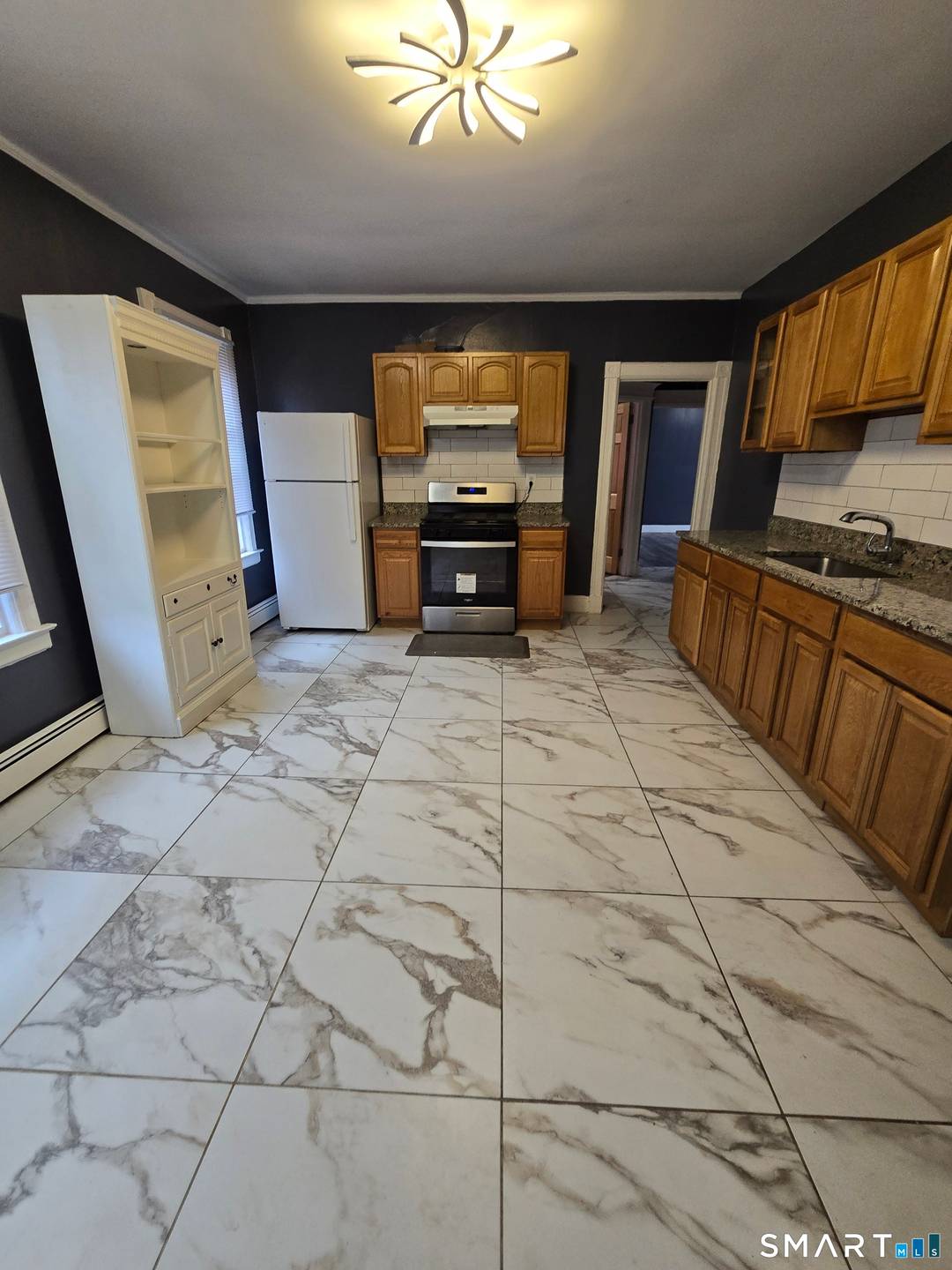 This 3 family is a great refreshed home for owner occupied or investment.