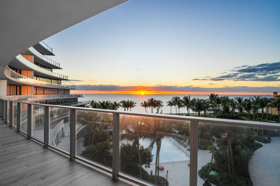 Experience opulent coastal living in this showstopping corner flow through residence with panoramic exposure from ocean to city.