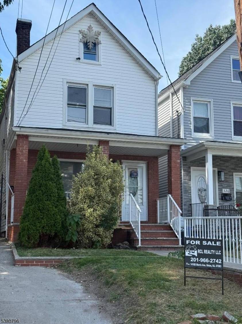 Enjoy a beautifully updated home featuring stunning Brazilian cherry hardwood floors, a modernized kitchen and bathrooms, and a spacious finished basement.