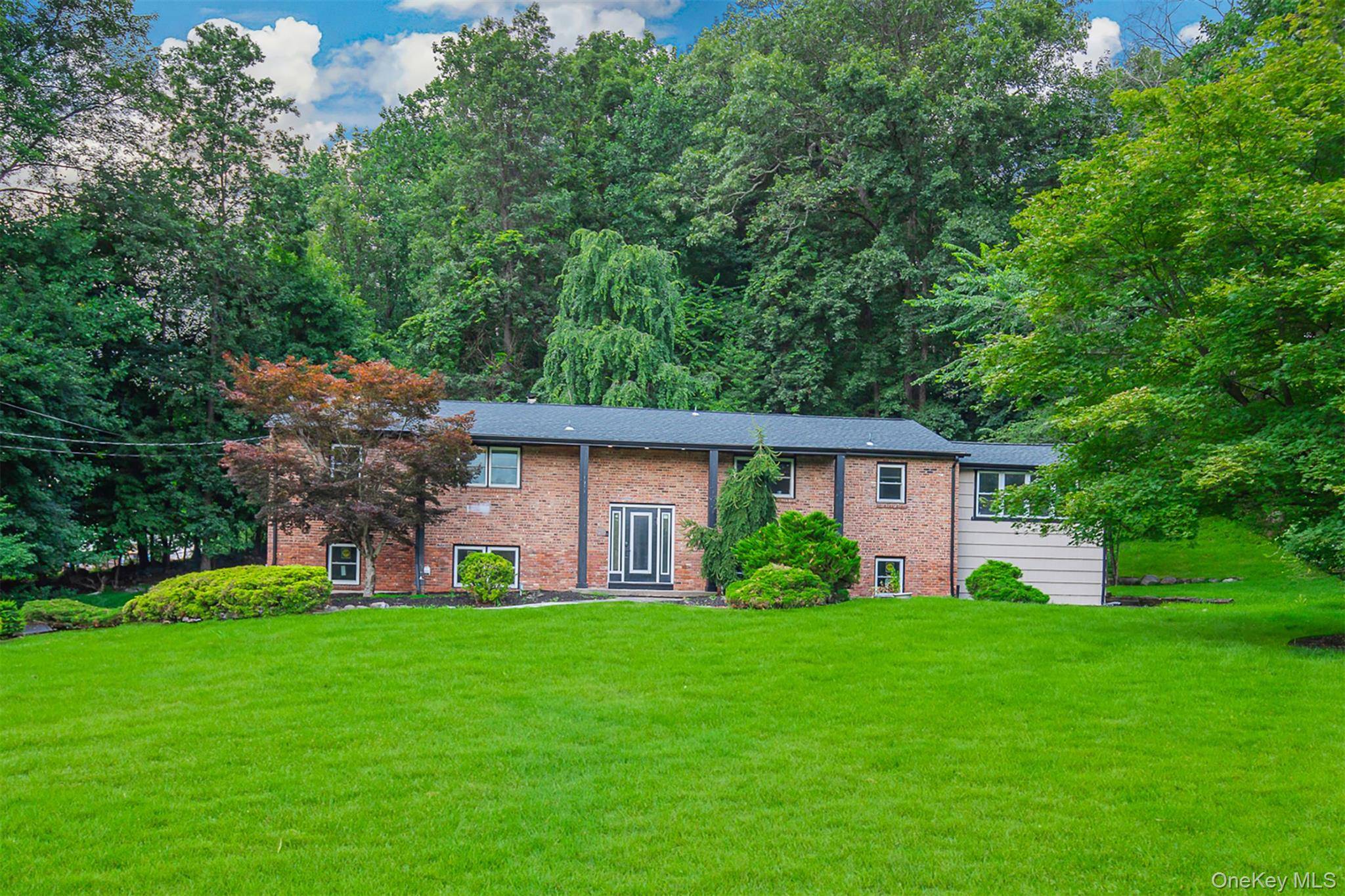 Renovated Raised Ranch located on a quiet cul de sac in desirable Wesley Hills.