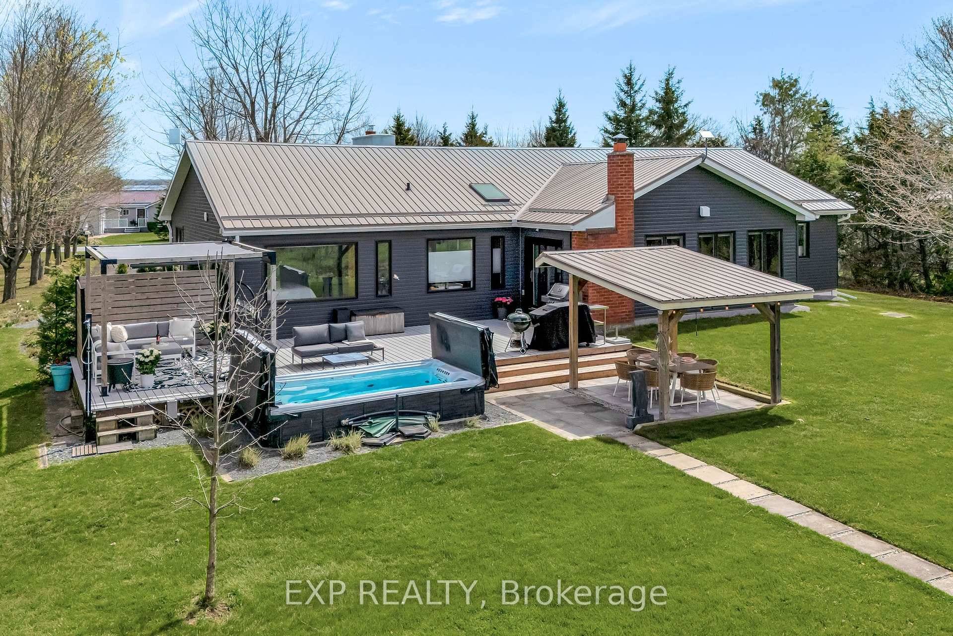 Welcome to 135 Hiscock Shores Road a stunning rural escape nestled in the heart of Prince Edward County.