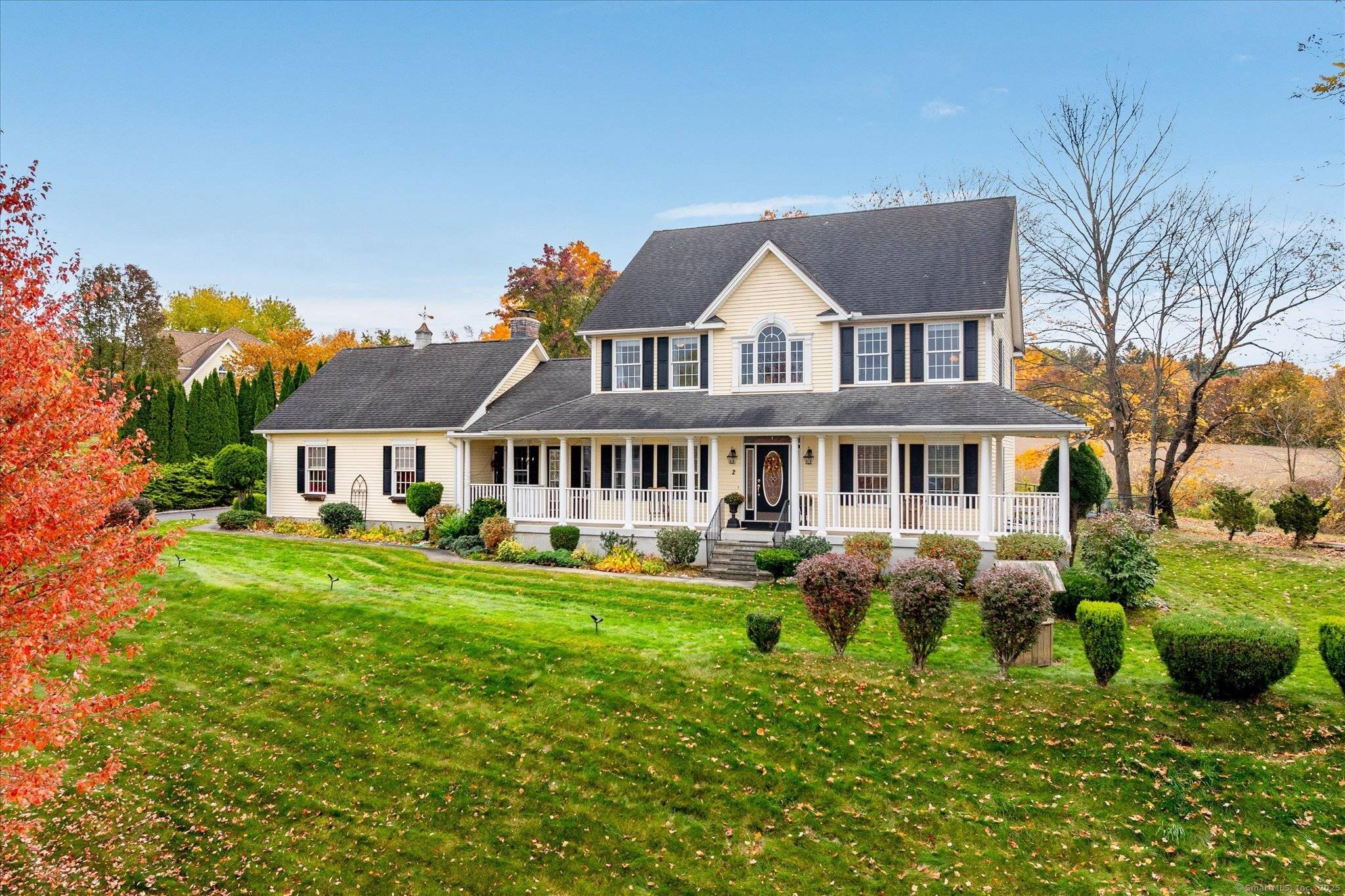 Set against a backdrop of brilliant fall colors, this stunning 4 bedroom, 2.