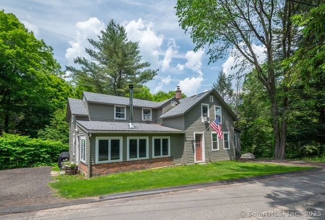 NOTE NEW PRICE POINT FOR THIS LOVELY WOODBURY RESIDENCE !