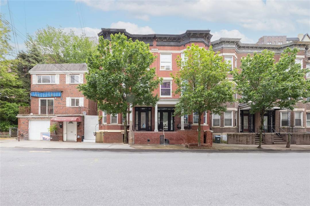 Opportunity knocks, 3 times, for this historic semi attached 3 family row house.