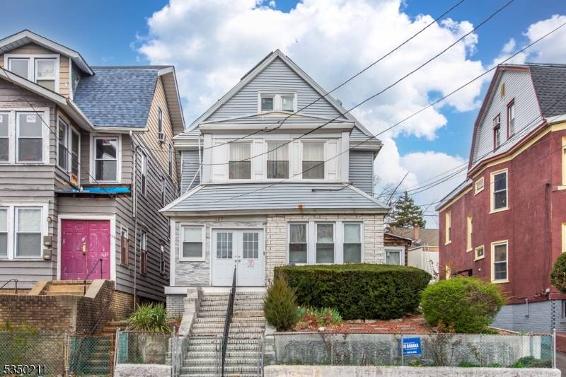Welcome to this massive 6 bed, 2 full half bath colonial home in Weequahic.