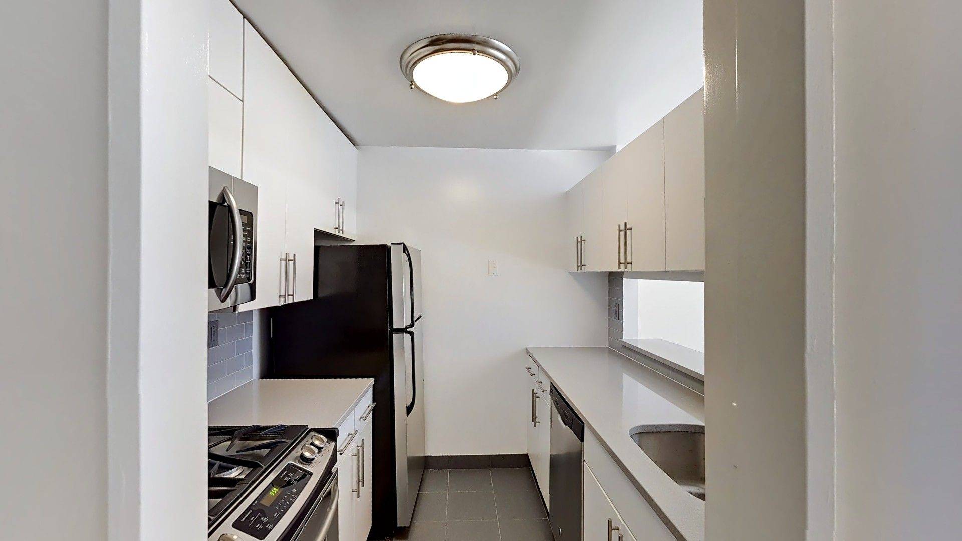 Great two bedroom with a gourmet kitchen with stainless steel appliances and stone countertops and wood floors throughout.