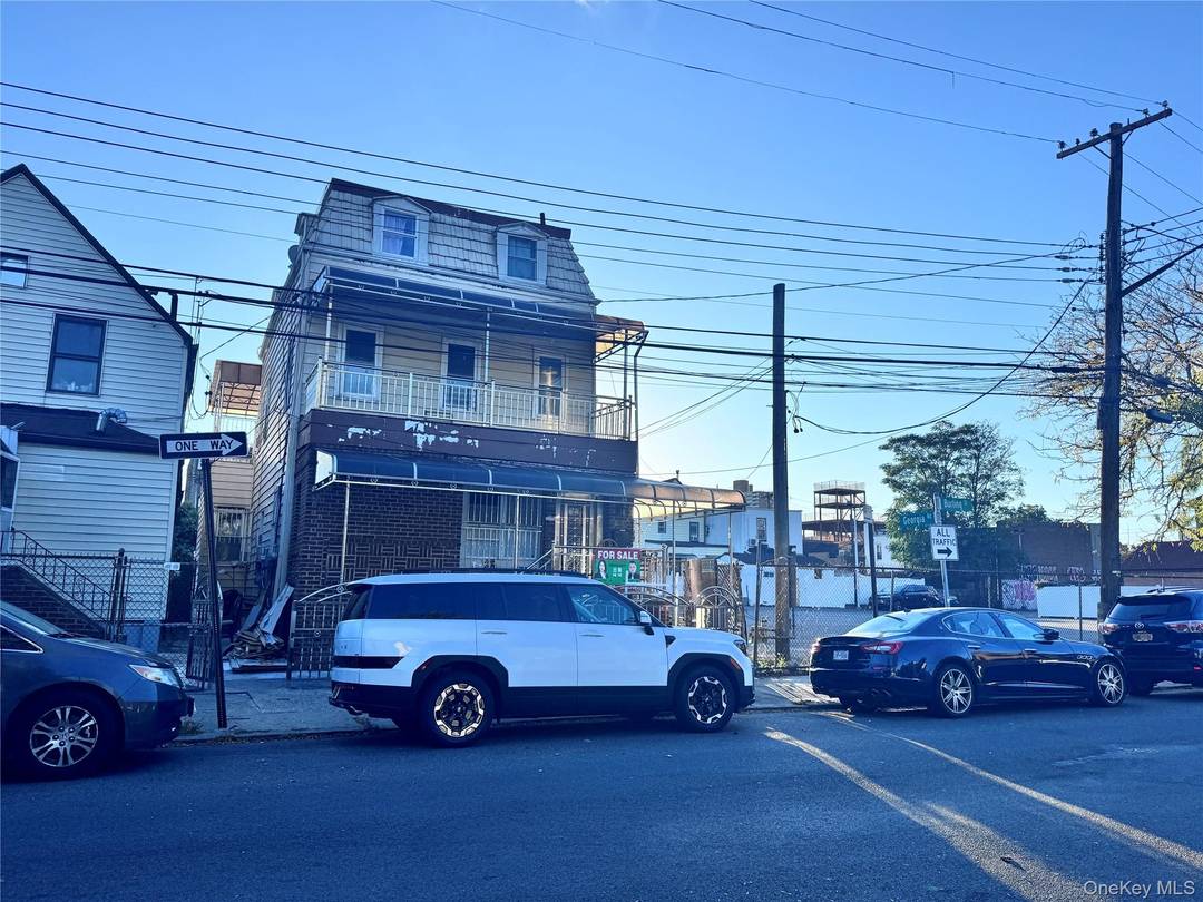 Prime Flushing Location Legal 3 Family Excellent Condition Welcome to this beautifully maintained legal 3 family brick home nestled on a quiet residential street in the heart of Flushing.