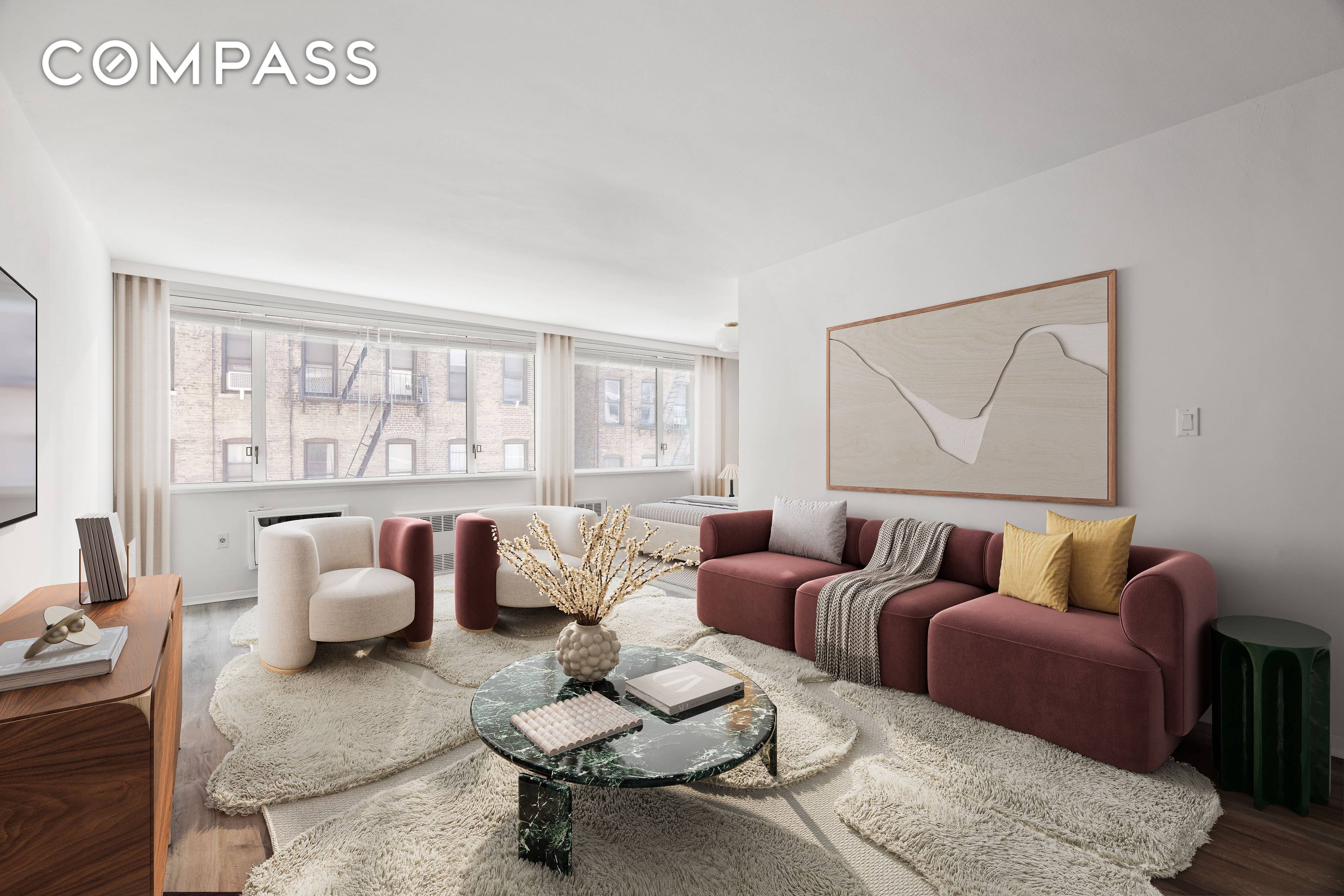 This thoughtfully designed alcove studio offers a highly functional layout, ideal for maximizing both style and space.