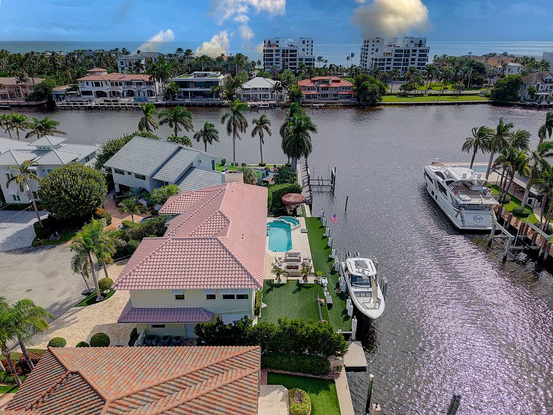 Waterfront Masterpiece with Intracoastal ViewsStunning home with panoramic Intracoastal views and extra wide canal !