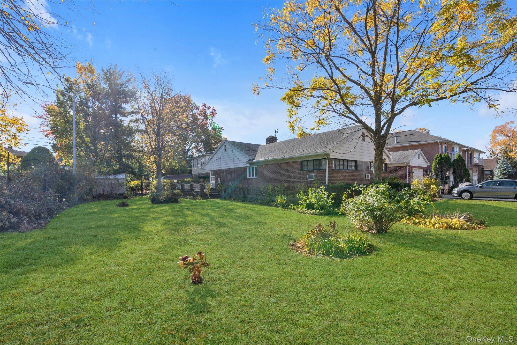 Welcome home to this expanded 3 bedroom brick ranch in the heart of Bay Terrace.