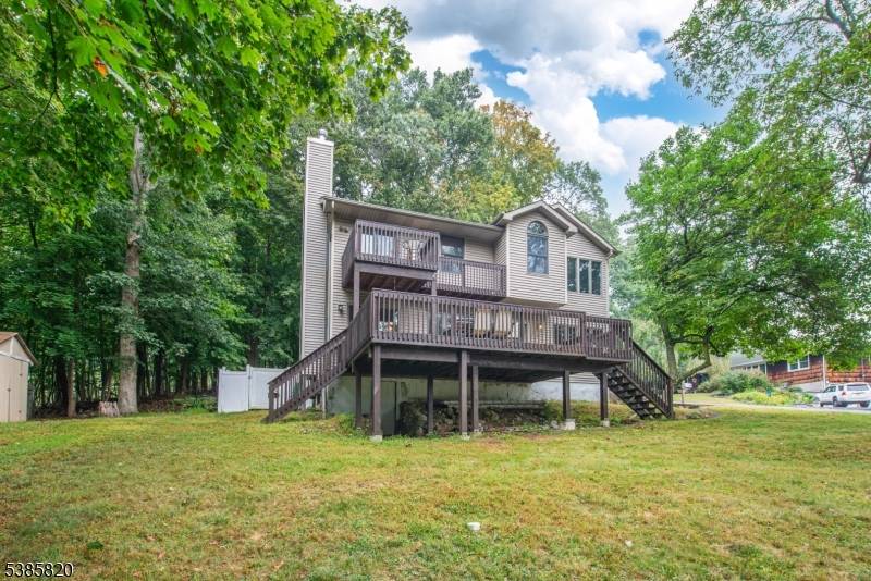 Expanded Custom Colonial Offers Exceptional Seasonal Lake Views Of Desirable Lake Hopatcong !