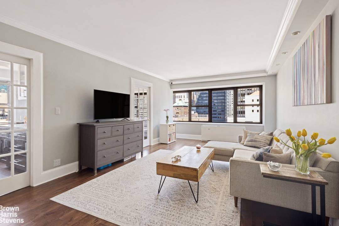 This high floor spacious two bedroom, one and a half bath home has been totally transformed, with no details spared.