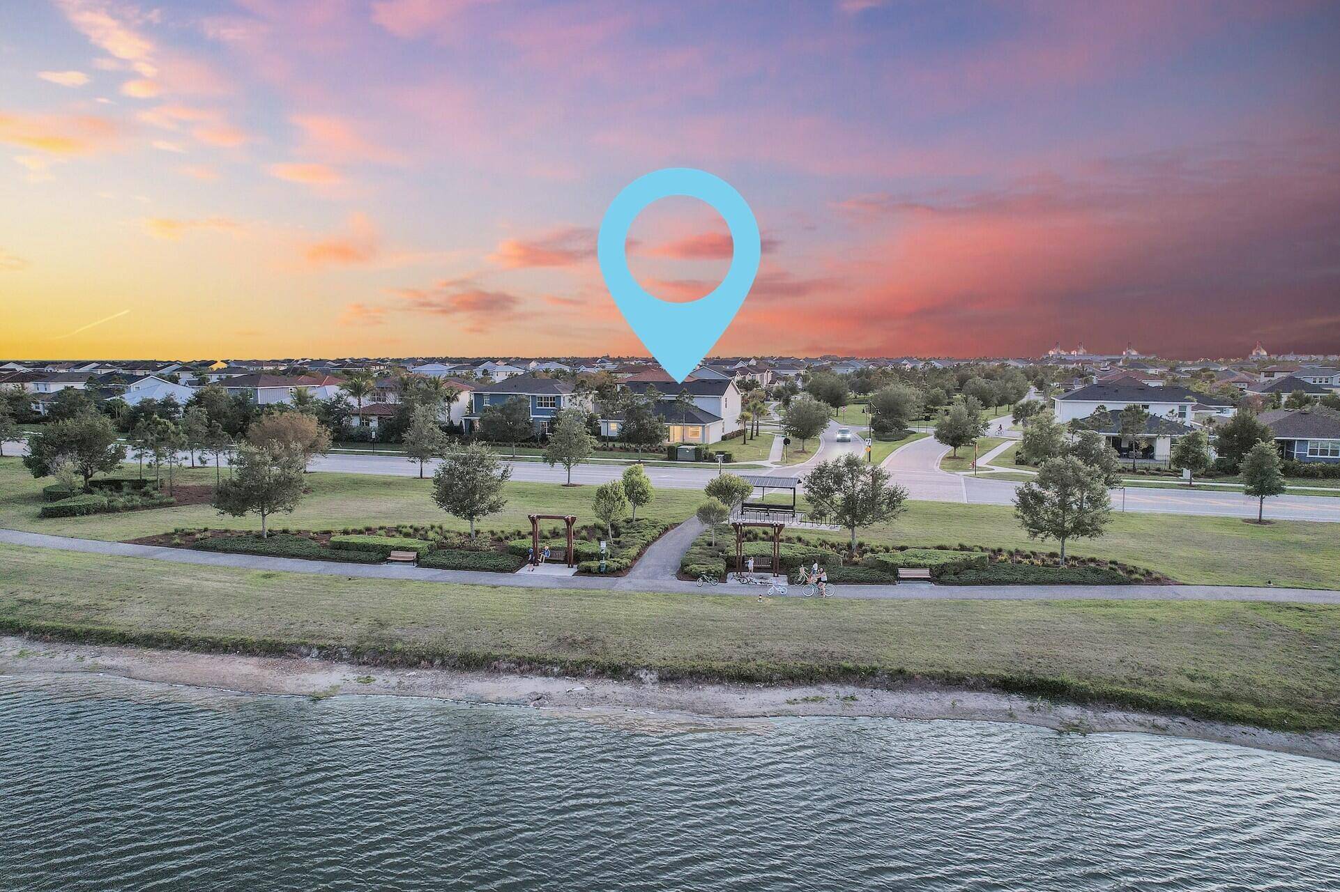 Rare Waterfront Corner Lot lake views from kitchen, living room and primary bedroom !