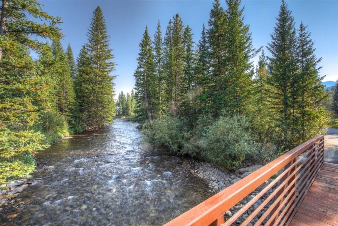 Incredibly rare opportunity to build your legacy home on a 10 acre lot with the Blue River flowing through it.