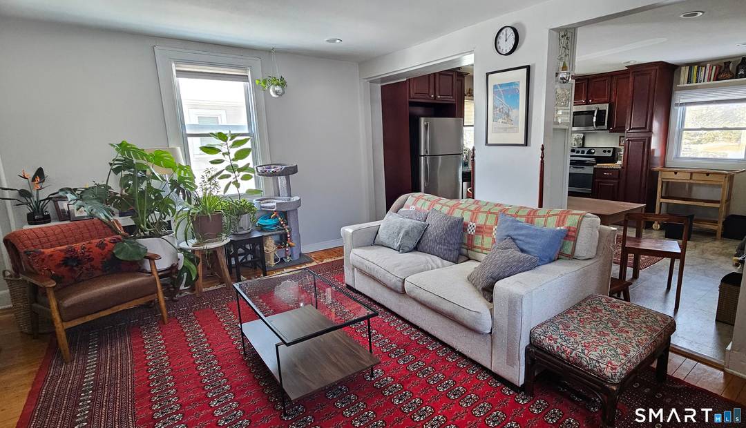 In Town Two Family Multiple Income Strategies Prime Walkable Location Well located 1930s Colonial two family just steps to the train, bus, restaurants, theater, and downtown amenities delivering the walkable ...