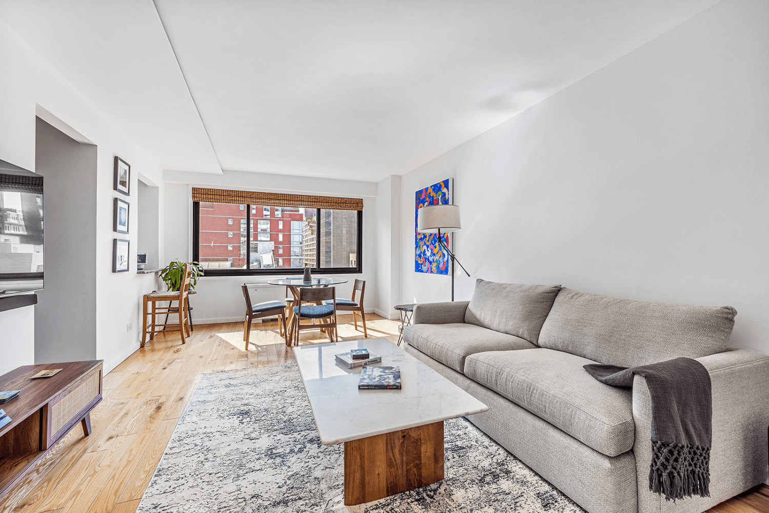 THE APARTMENT Two studios thoughtfully combined into a spacious, sunny, move in ready, quiet home with city views and a thoroughly modern layout to accommodate today's lifestyle.