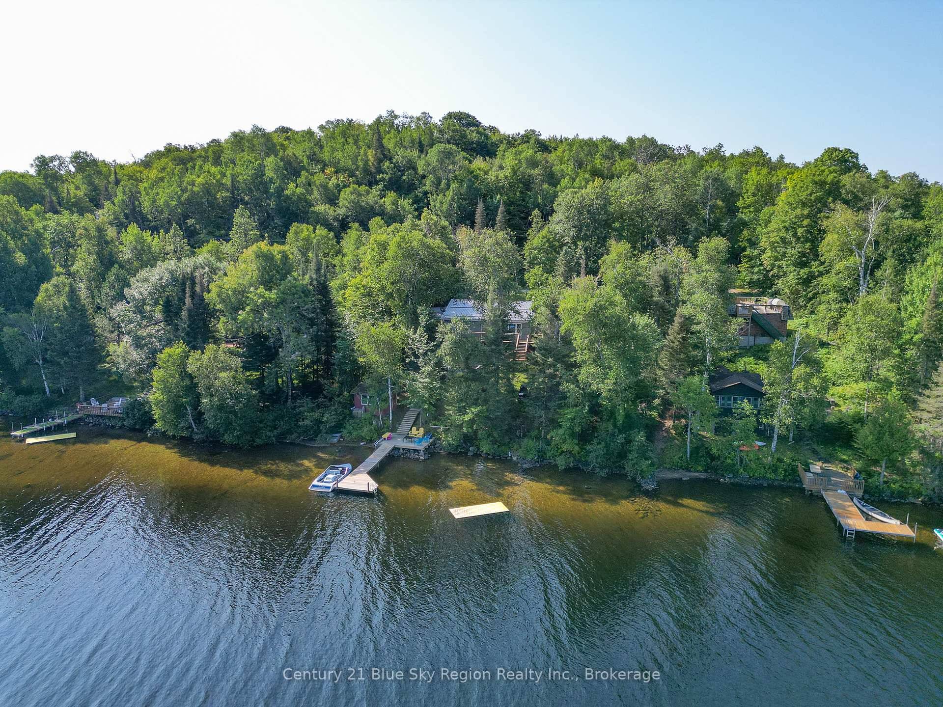 Discover the beauty of lakefront living with this 4 bedroom home perfectly situated on scenic Trout Lake.