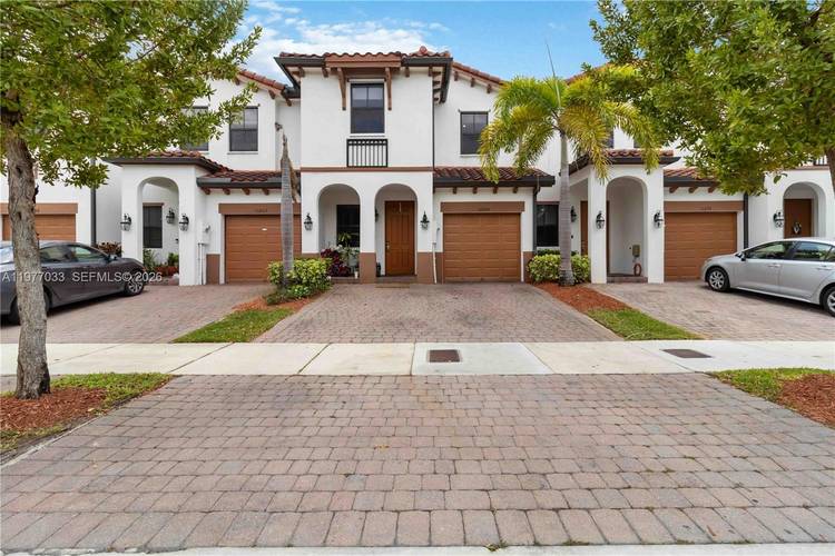 Beautiful 4 bedroom, 3 bathroom townhouse in the highly desirable gated community of Astoria at Central Park.