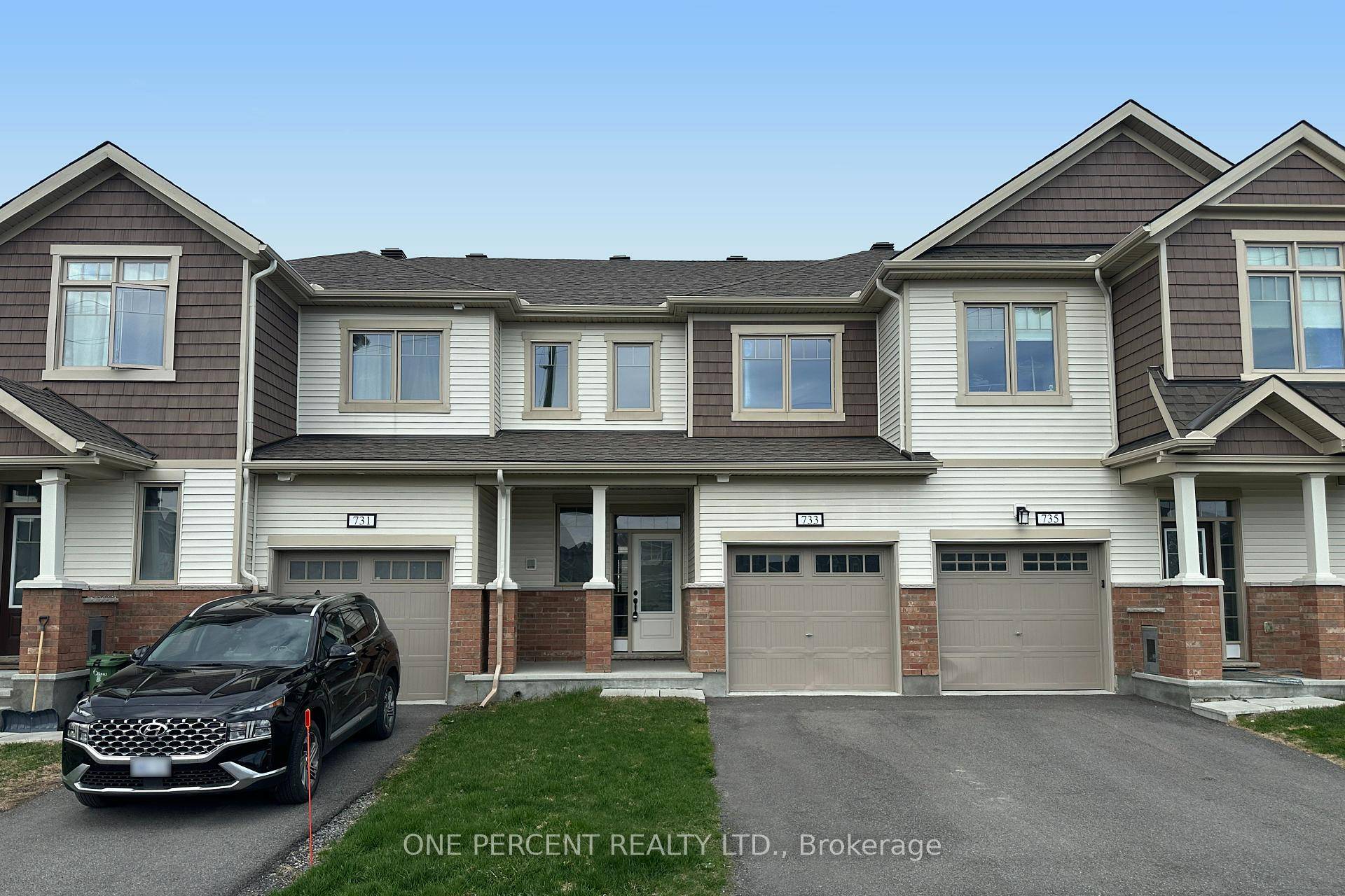 Stunning 2021 built townhome where modern design, high end finishes, and an abundance of natural light create a warm and inviting atmosphere.