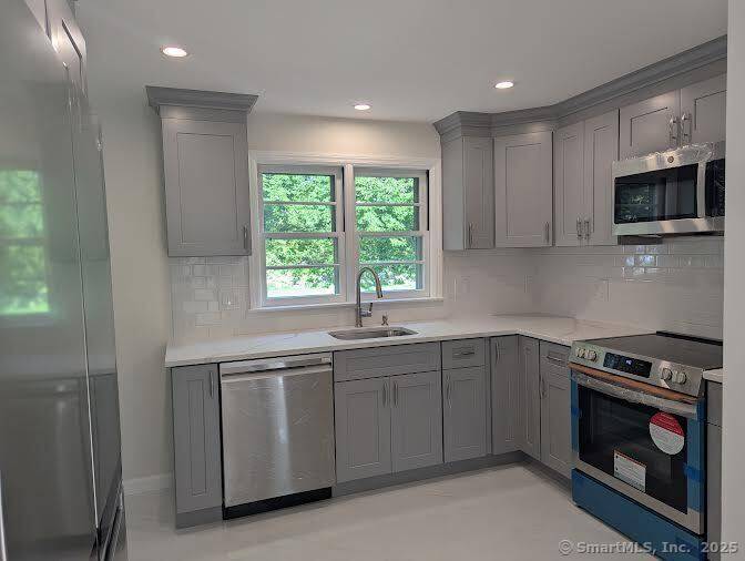 Welcome to 12 Eagle Road, a beautifully remodeled home offering style, comfort, and convenience in Norwalk's desirable Spring Hill neighborhood.