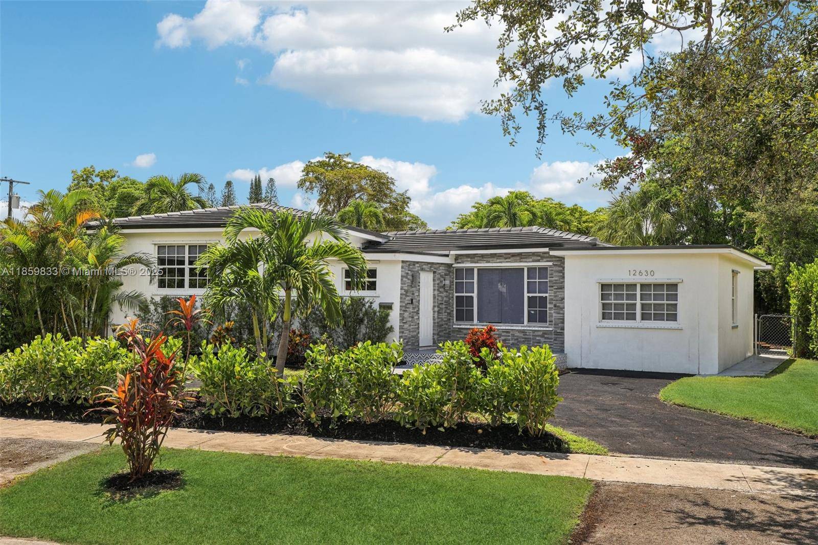 Experience modern living in this fully renovated Mid Century Modern retreat.