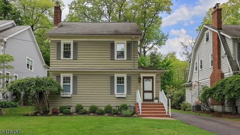 Warm, bright, and beautifully inviting, this charming Westfield home is set on an awesome block in a highly coveted and convenient neighborhood.