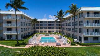 GORGEOUS SOUTHEAST OCEAN VIEWS FROM THIS 1 BEDROOM 1 BATH APARTMENT WALK IN TO THIS LOVELY APARTMENT DECORATED BY LAURA LARKIN INTERIORS JUST BRING YOUR TOOTH BRUSH LUGGAGE.
