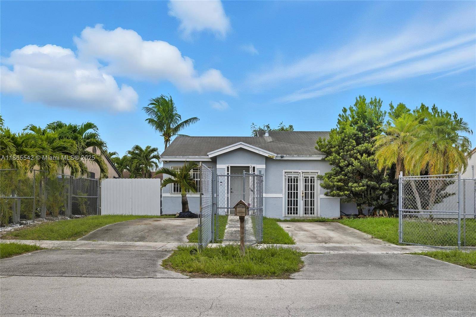 Charming Single Family Home with Dual Living Spaces in Homestead Ideal for Investors or Multigenerational Living !