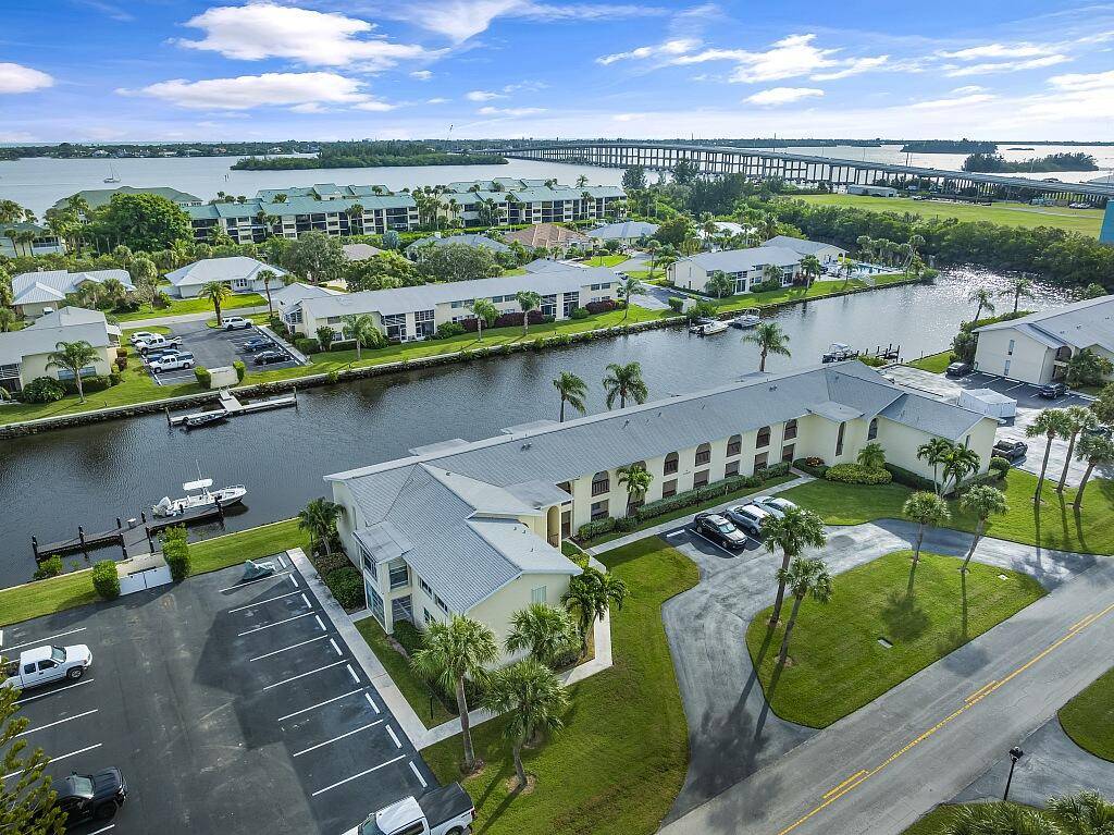 Abundant tropical living awaits at this completely renovated 1st floor unit with scenic views of the canal and intercostal access !