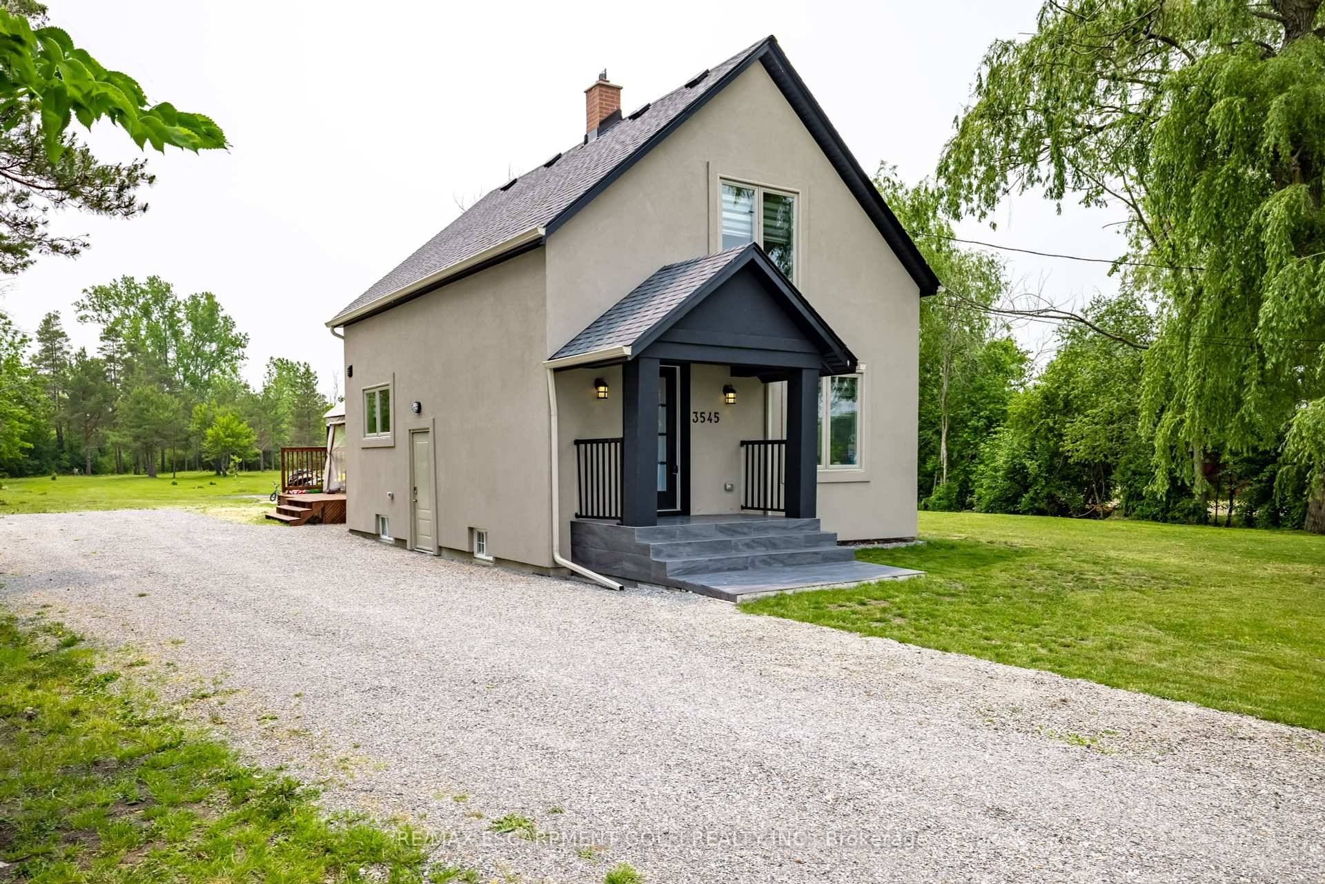 This gorgeous 3 bedroom fully renovated home located in the quaint town of Ridgeway sits on almost an acre of lush tree lined property.