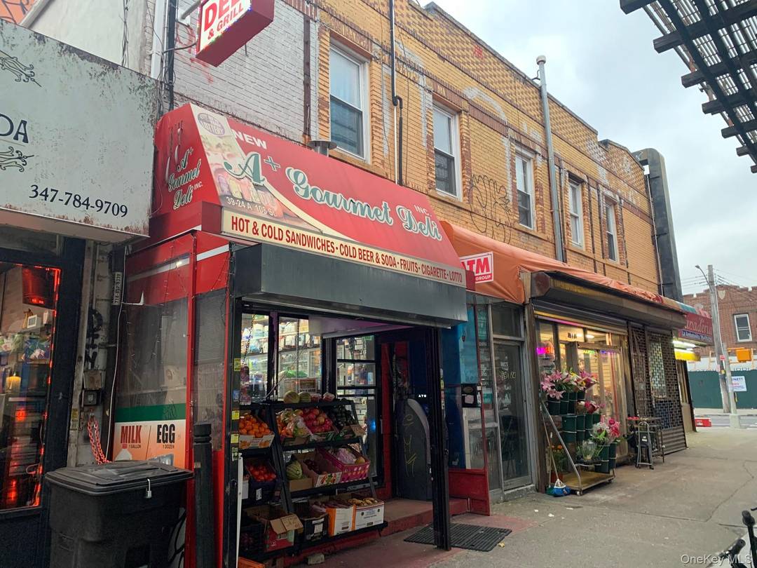 Excellent Location Mixed Use Building This well located mixed use property features six commercial stores and two residential apartments.