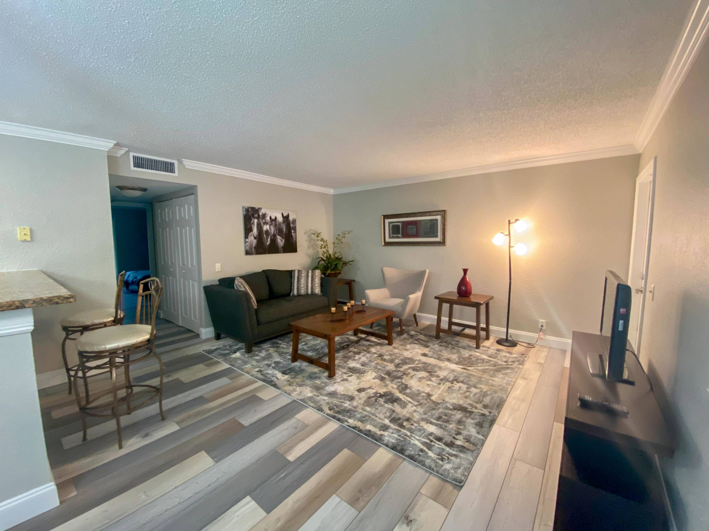 Updated turnkey two bedroom two bath condominium within walking distance to restaurants, day spa, gym, and more !
