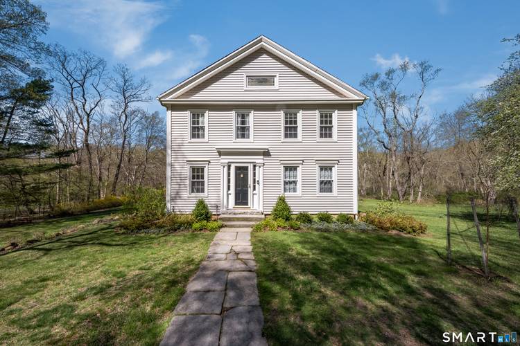 Discover the perfect blend of antique charm and modern convenience at 50 Ledge Hill Road.