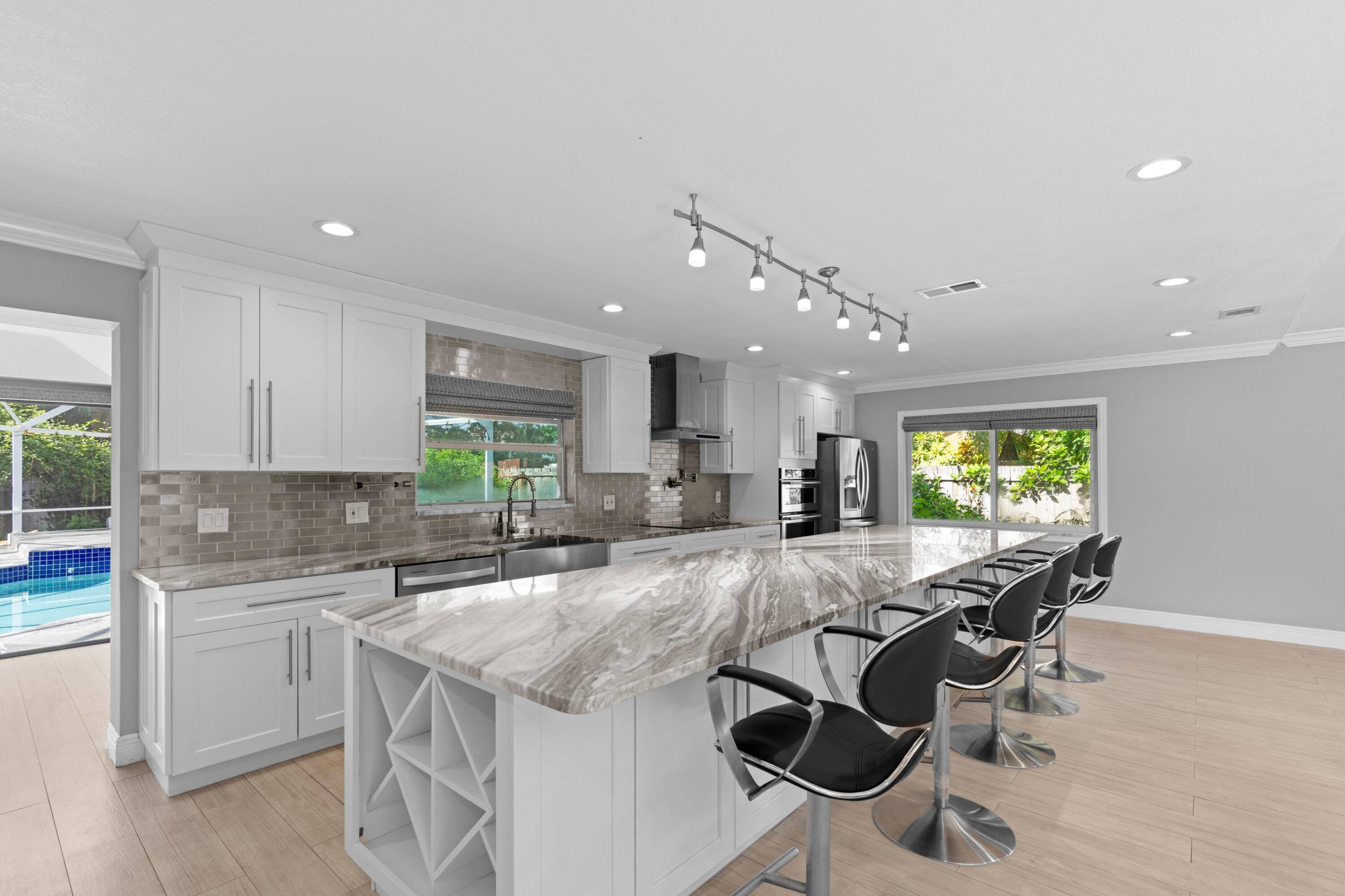 Located on a quiet cul de sac in one of Wellington's most desirable neighborhoods, this renovated 4 bedroom, 2.