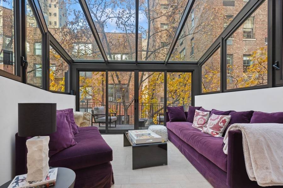 Enjoy a luxurious Upper East Side lifestyle in this fully furnished rental nestled within a gorgeous 19th century townhome less than two blocks from Central Park.