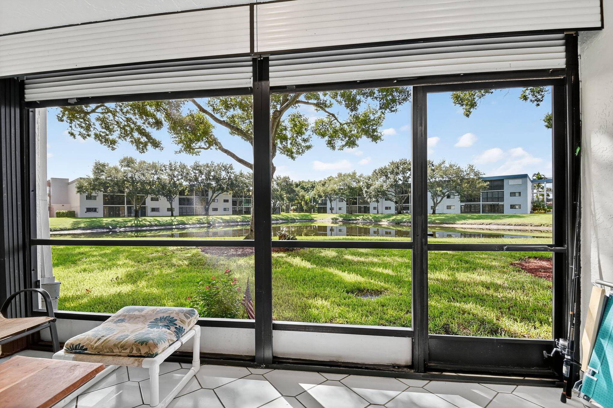 Bright and freshly painted, this charming first floor condo offers peaceful garden and lake views.