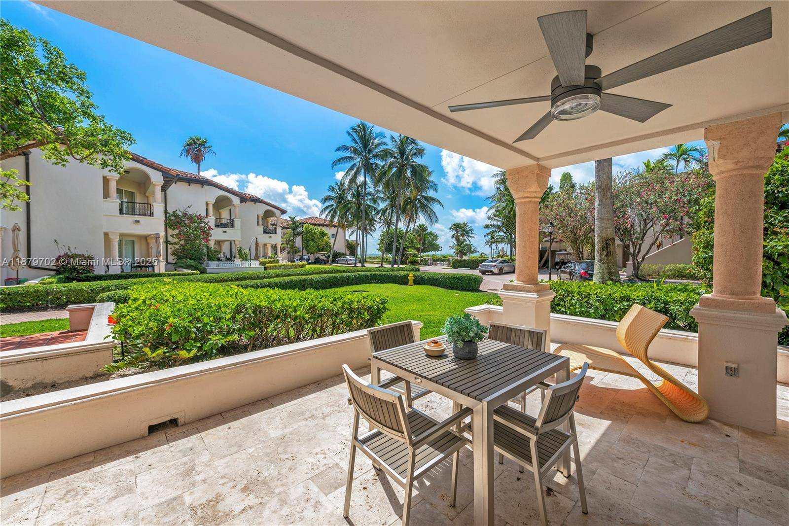 Live the Fisher Island lifestyle in this exceptional fully furnished, renovated ground floor Seaside Villa.