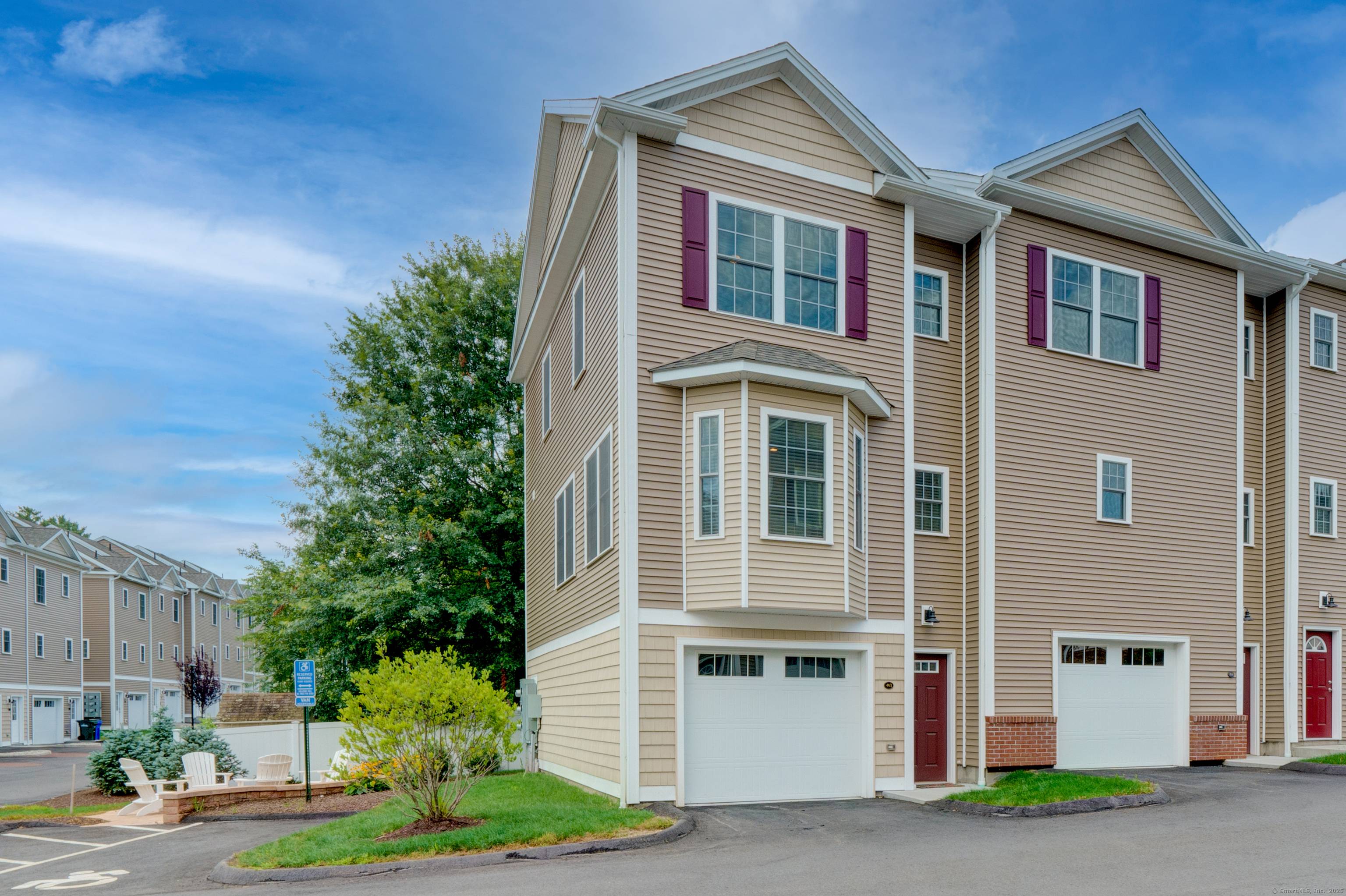 This spacious modern 3 bedroom, 2 full bathroom end unit offers everything you could want.