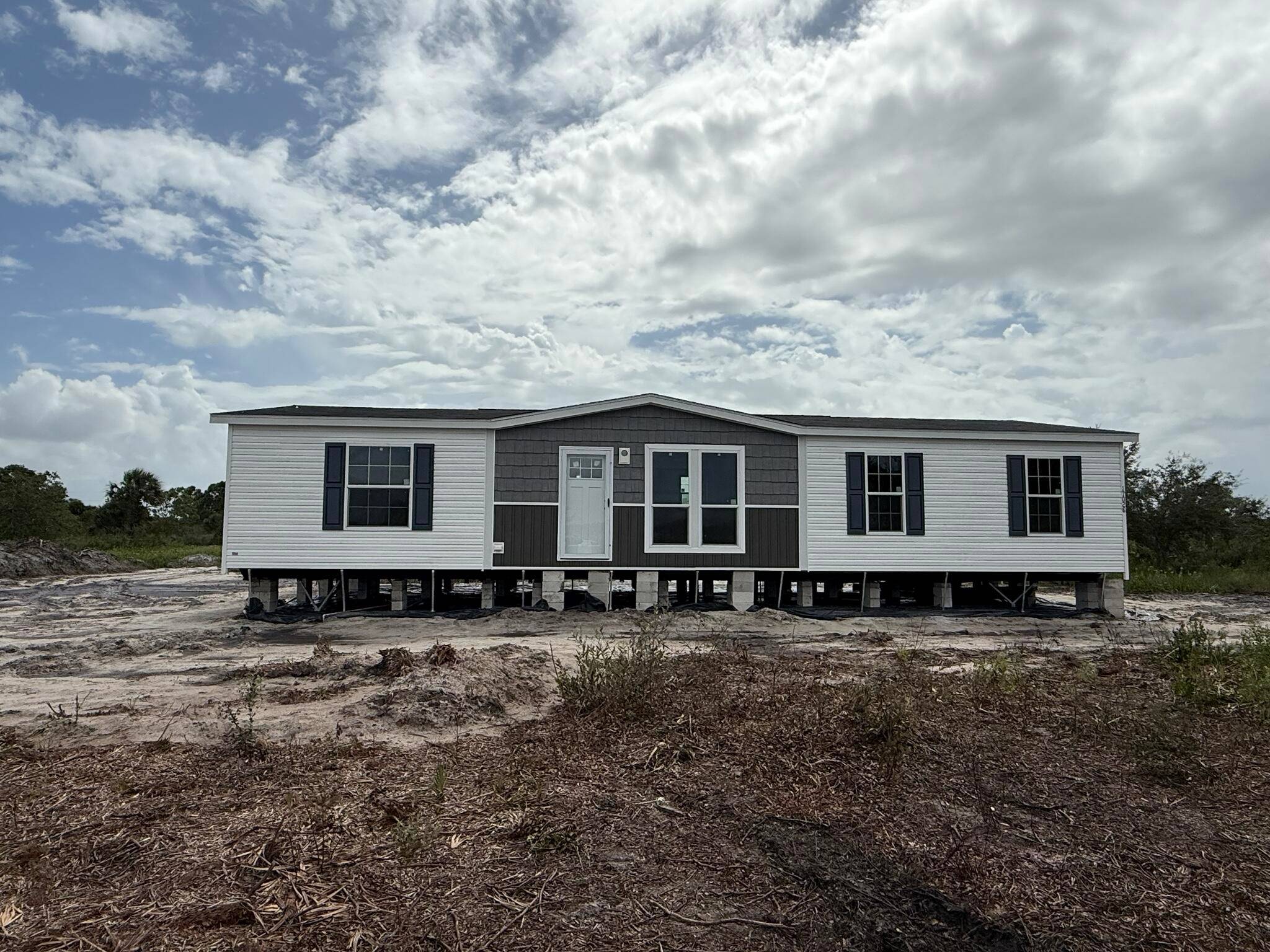 Brand New 3BR 2BA 1. 25 Acres Prairie Viking Community Move in ready and beautifully upgraded, this 1, 493 SqFt Champion Embrace home offers a modern split floor plan with ...