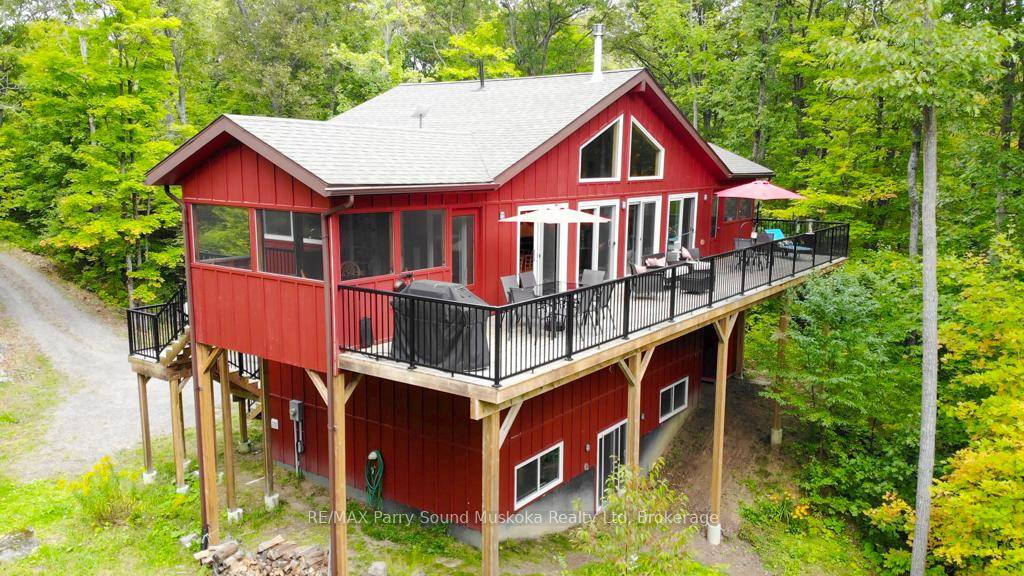 Discover year round living in this 3 level, 2017 built cottage on 1.