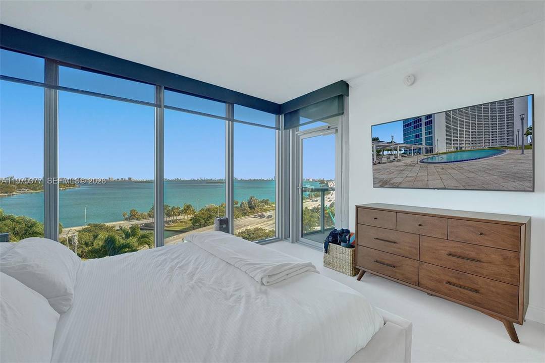 Unobstructed, breathtaking bay views welcome you the moment you step into this highly sought after and largest one bedroom line in the building.