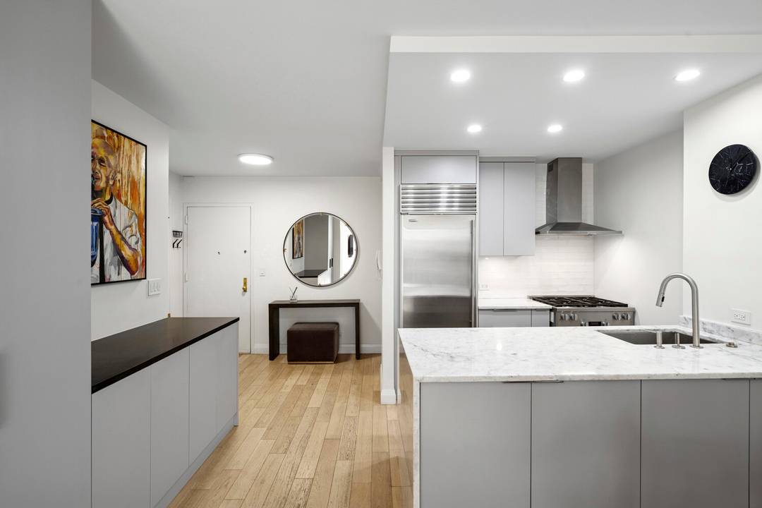 Welcome home to this beautifully gut renovated two bedroom, two bathroom residence, ideally located on a quiet, tree lined street in the heart of vibrant NoMad.