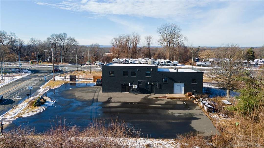 Rare opportunity to acquire a fully renovated, income oriented flex commercial asset positioned on a high visibility corner with strong frontage, traffic exposure, and excellent signage potential.