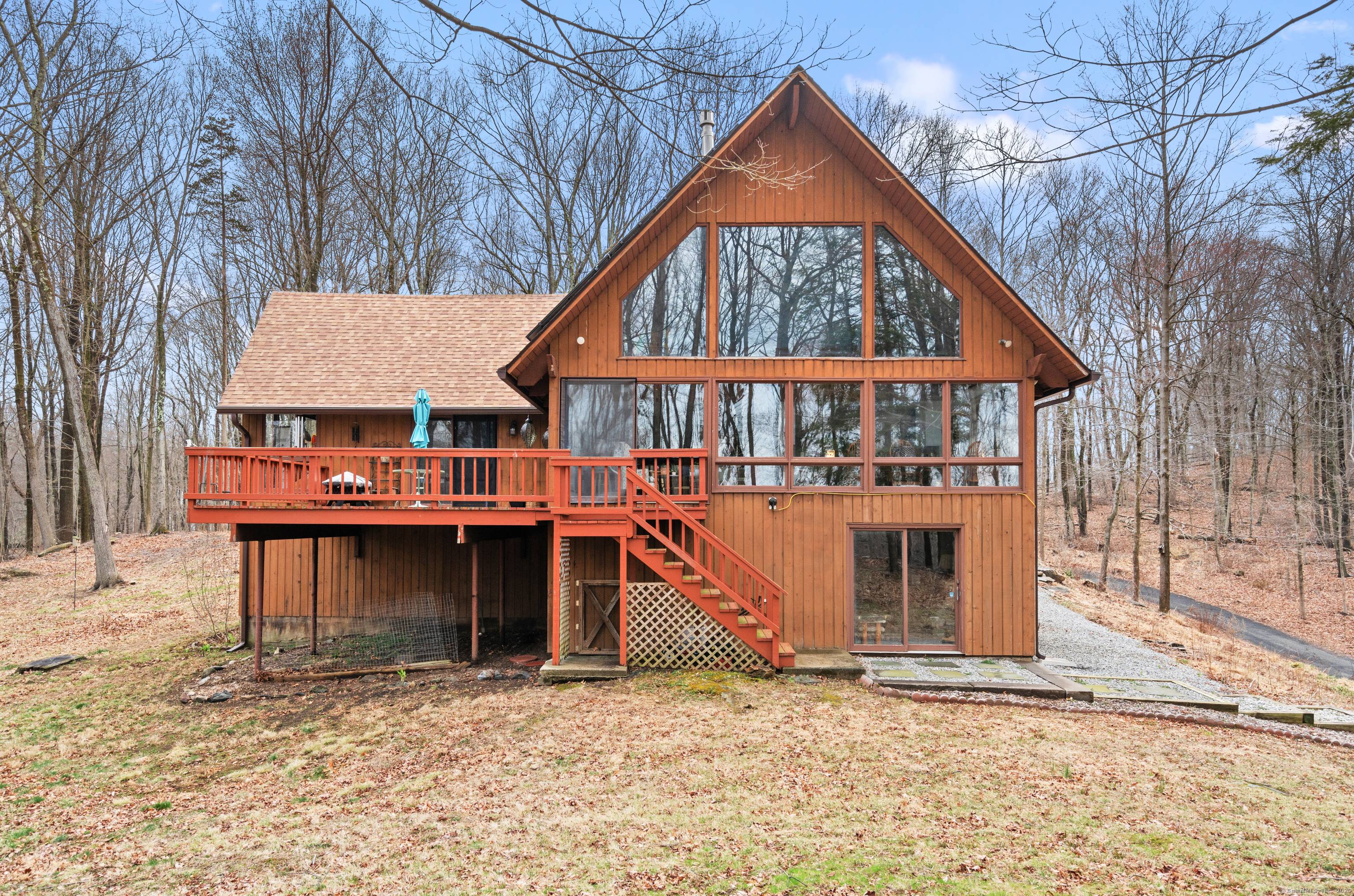 Peaceful, serene tranquility are just a few words to describe this stunning Contemporary A frame home, set on over 2 beautifully wooded acres with breathtaking views.