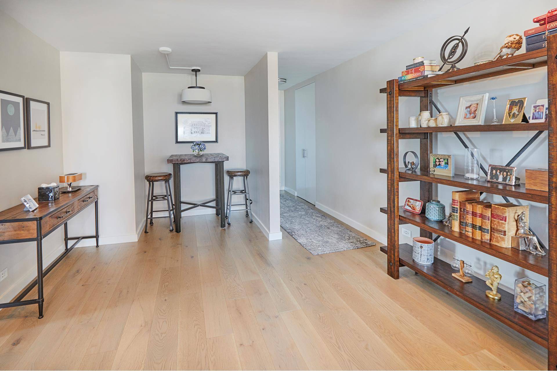 Wake up to magnificent sunrises over the East River from every room of this oversized, renovated, high floor, corner apartment at Mill Rock Plaza.