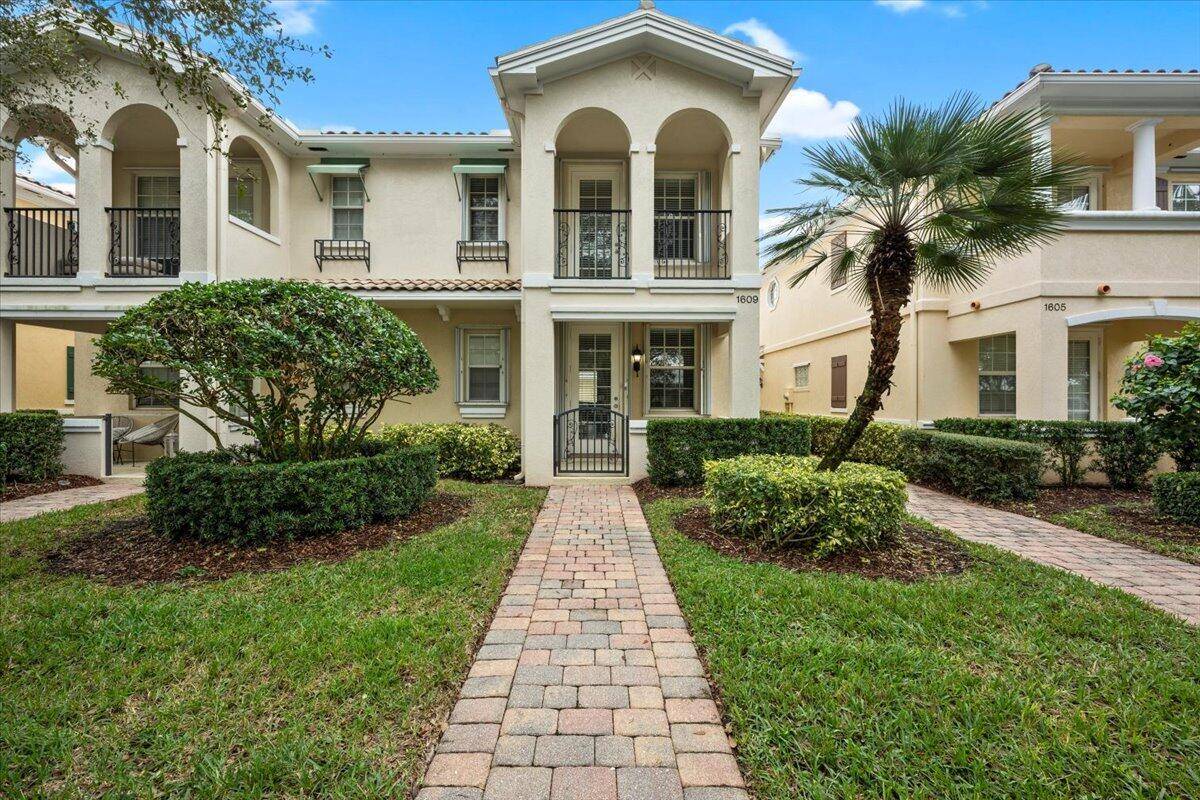Look no further ! One of a kind spectacularly designed DiVosta built Mediterrabean townhome located in the highly desirable neighborhood of Tuscany in Abacoa.